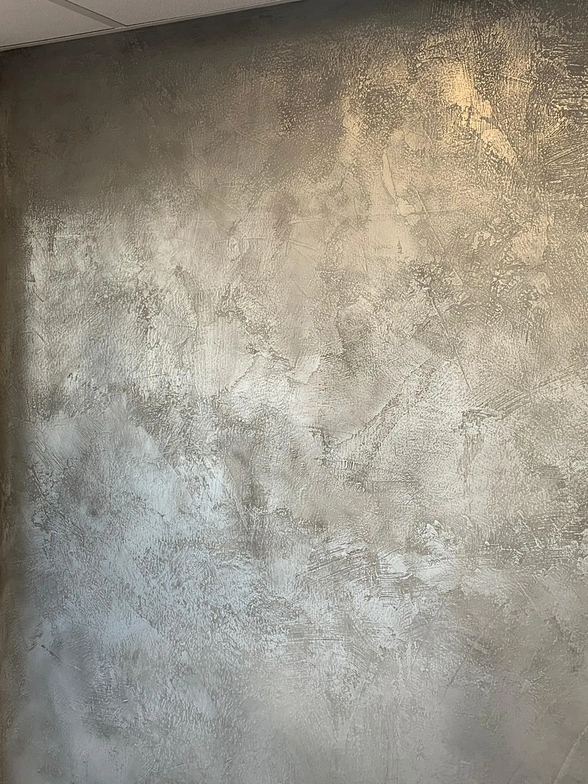 textured liquid metal wall finish