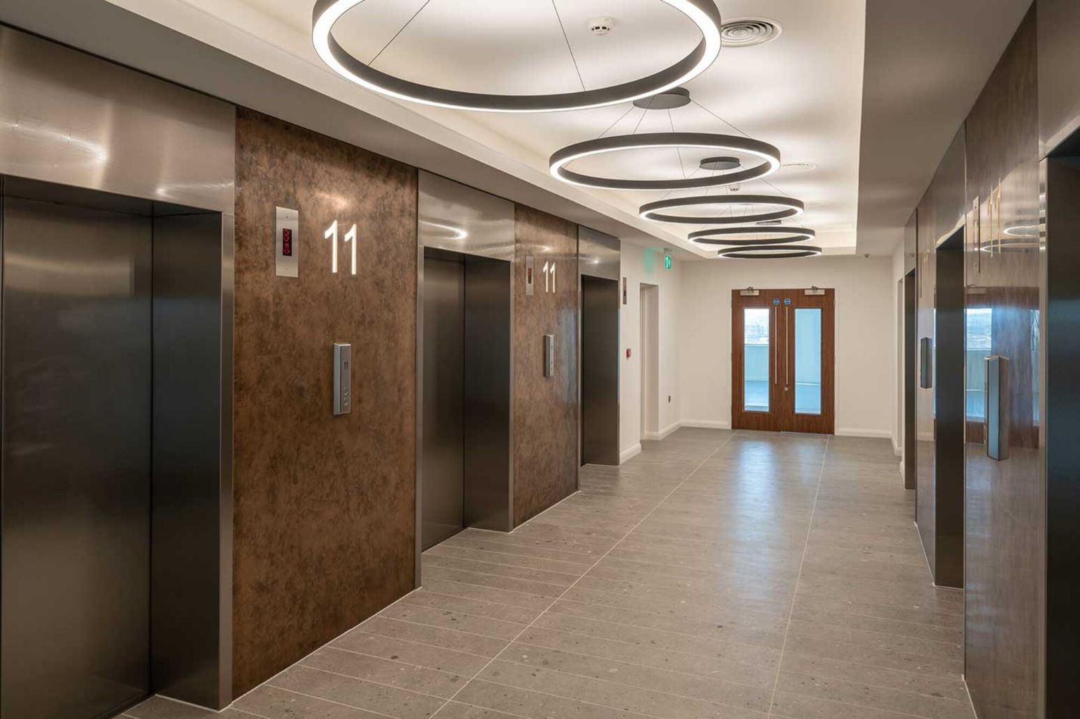 Liquid metal wall system in use in reception and lift area